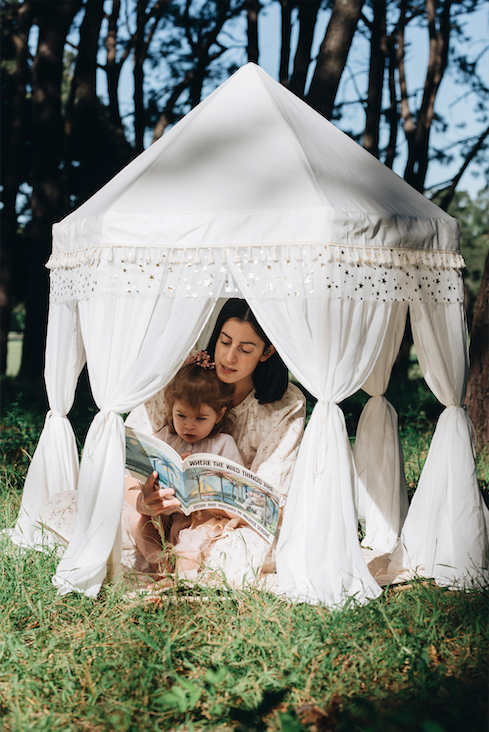 Our story begins in a children's canvas teepee